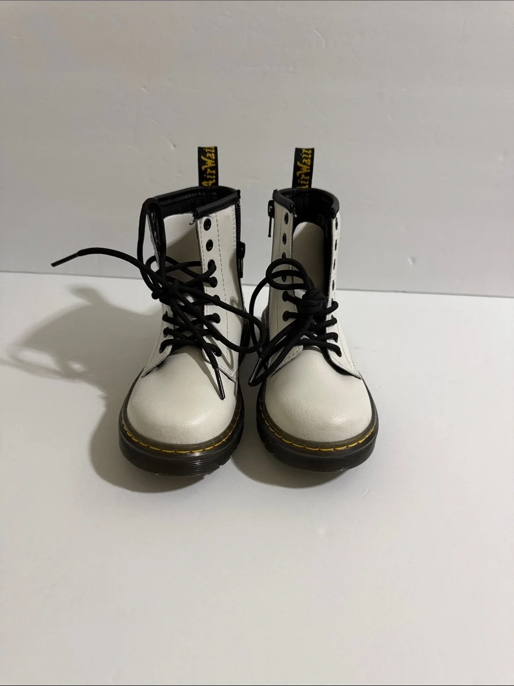 Dr. Martens Kids White Leather Ankle Boots with Black Accents